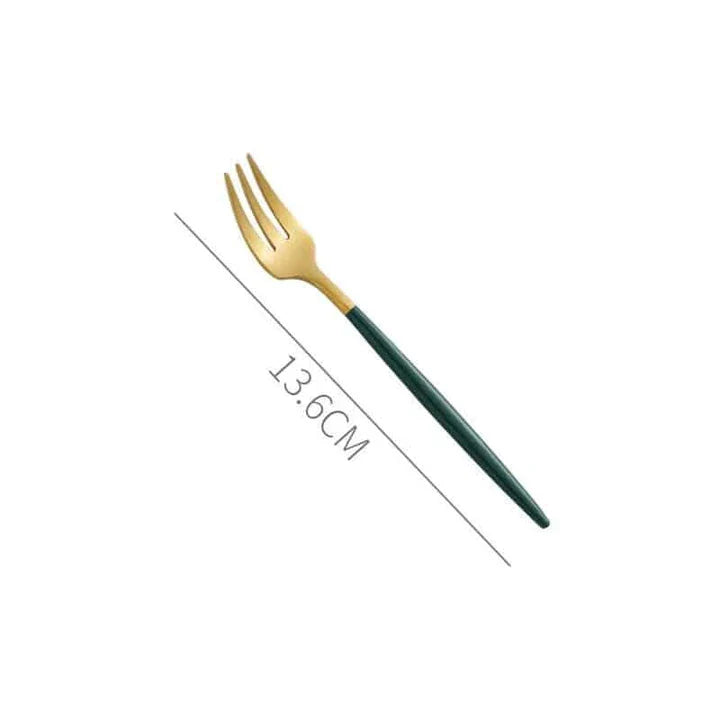 A set of minimalist, eco-friendly tableware in green and gold tones, including plates, bowls, and utensils.
