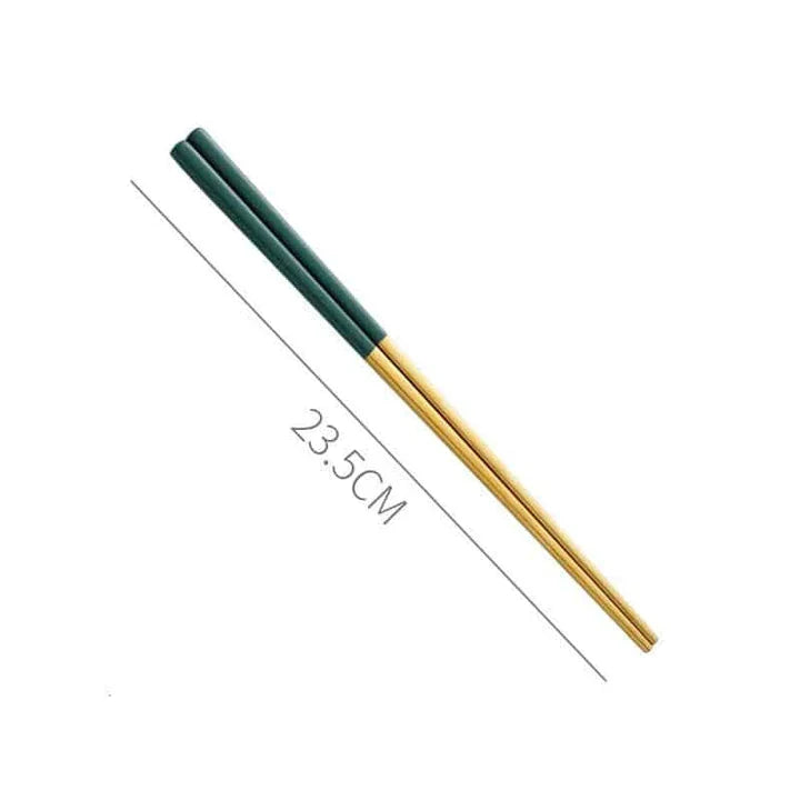 A set of minimalist, eco-friendly tableware in green and gold tones, including plates, bowls, and utensils.