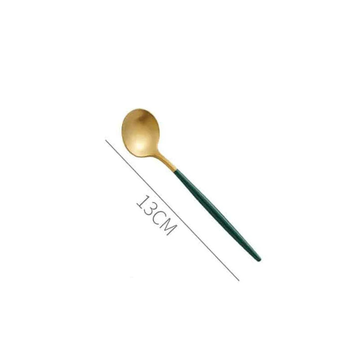 A set of minimalist, eco-friendly tableware in green and gold tones, including plates, bowls, and utensils.