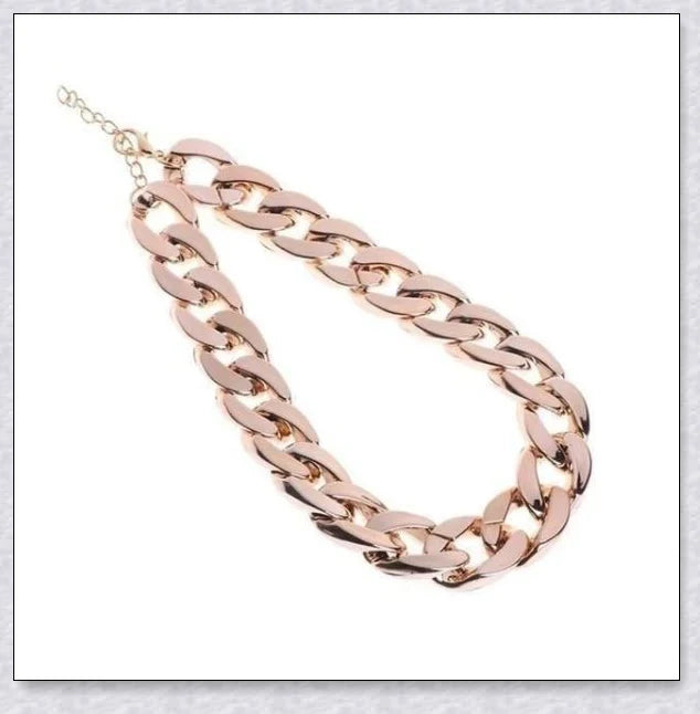 Thick gold chain dog collar with a stylish and durable design, perfect for adding a touch of urban sophistication to your pet's look.