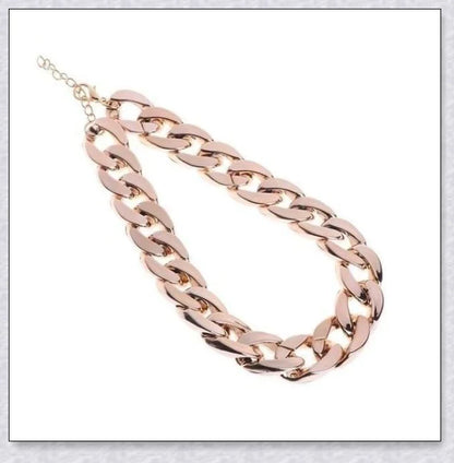 Thick gold chain dog collar with a stylish and durable design, perfect for adding a touch of urban sophistication to your pet's look.