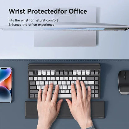 Ergonomic keyboard wrist rest pad with integrated desktop storage for organised workspace