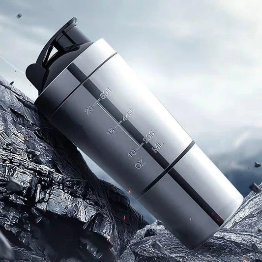 Stainless steel shaker bottle with dual compartments for separating supplements and liquids