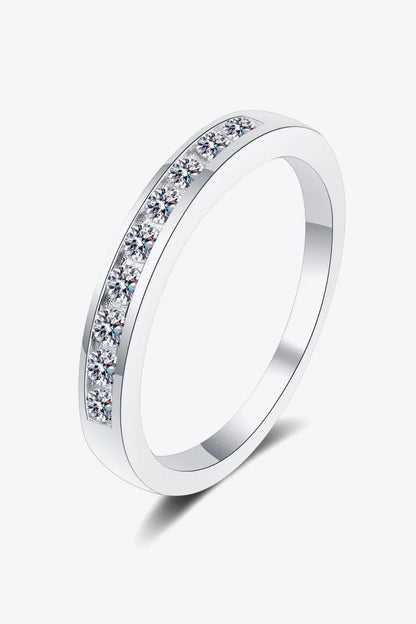 A modern, minimalist 925 sterling silver ring featuring a sparkling moissanite centre stone