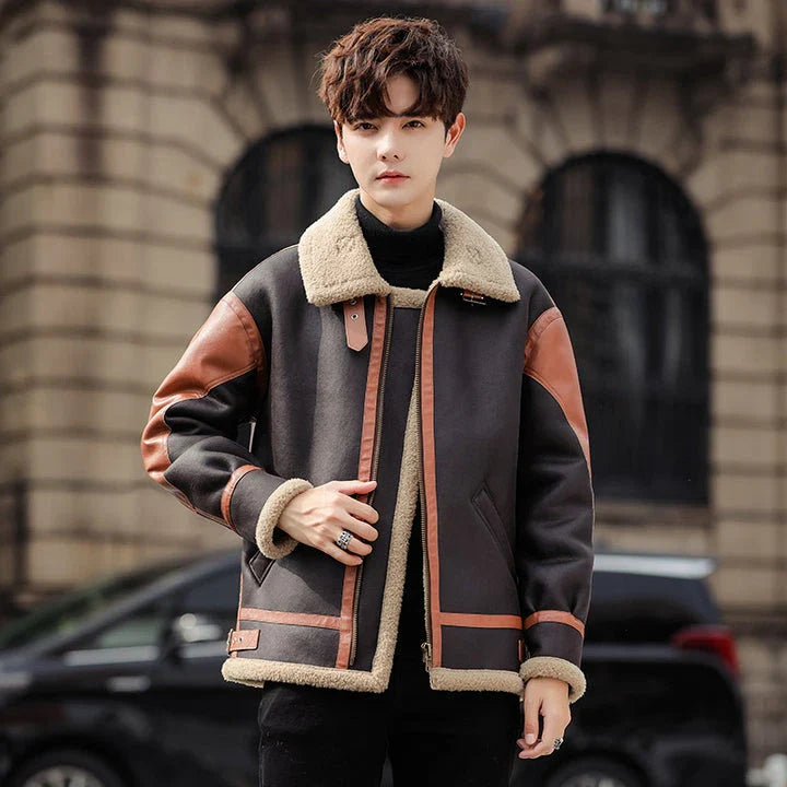 Handsome man wearing a dark coffee-coloured, fur-lined, thickened casual coat with a fashionable style