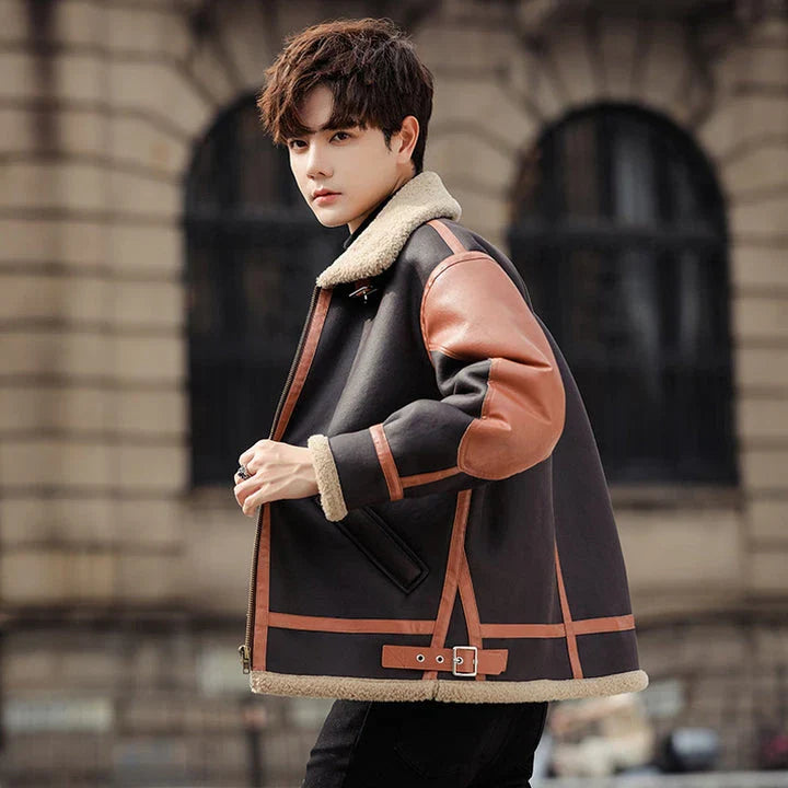 Handsome man wearing a dark coffee-coloured, fur-lined, thickened casual coat with a fashionable style