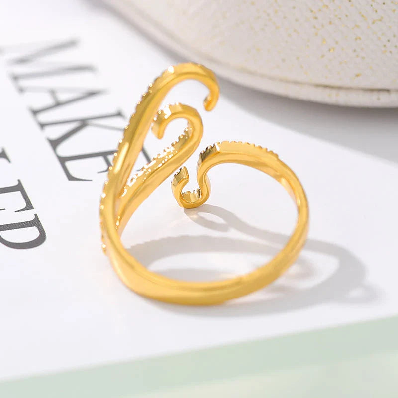 Adjustable octopus tentacle wrap ring made of durable stainless steel with a sleek, elegant design