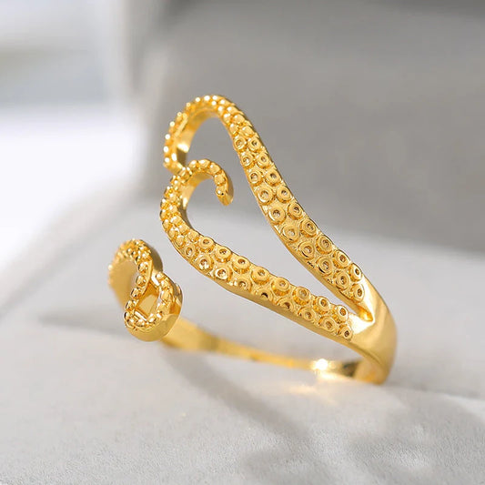 Adjustable octopus tentacle wrap ring made of durable stainless steel with a sleek, elegant design