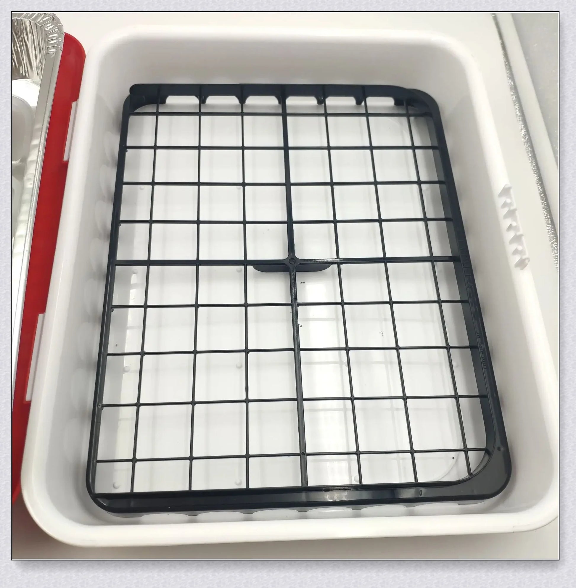 The Classy Casserole Carrier - a stylish and convenient way to transport and serve hot or cold dishes for British gatherings and events