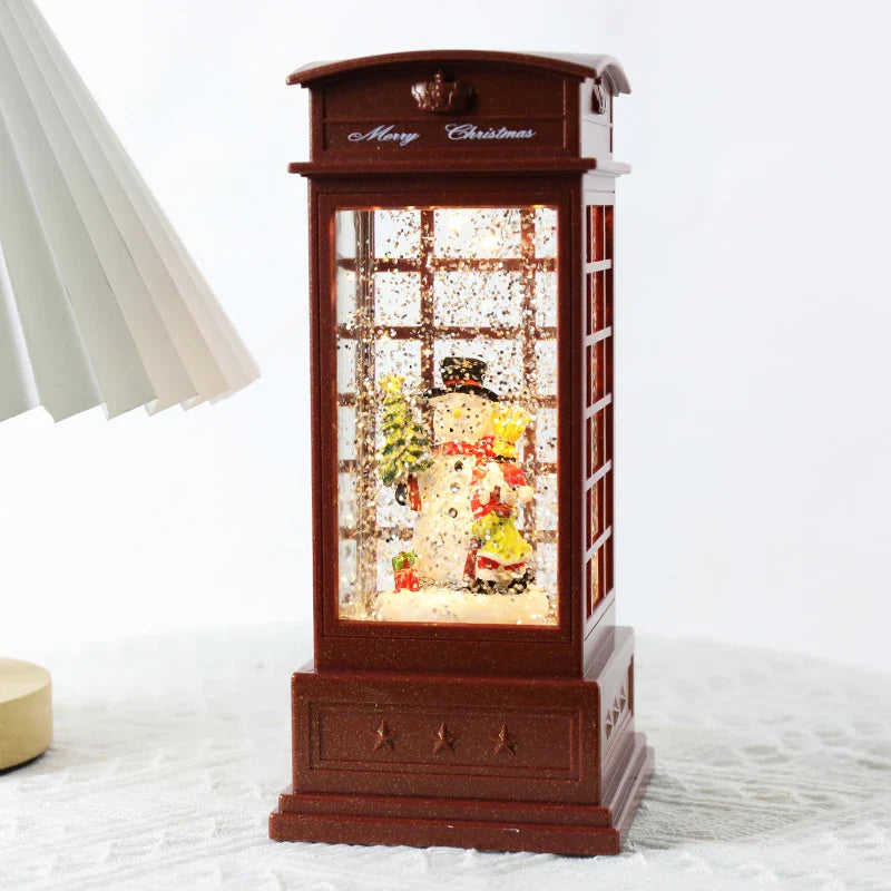 Festive telephone booth music box ornament with snowman and Christmas tree decorations