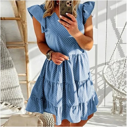 Elegant digital print v-neck ruffled dress in blue, featuring a cascading ruffle design and premium polyester fibre material.