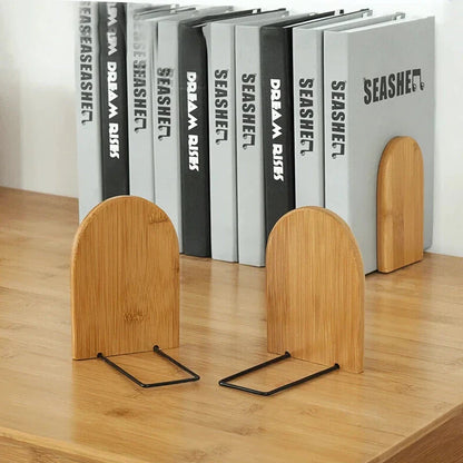 Natural bamboo desktop organizer and bookend with a simple, elegant design that optimises vertical storage space