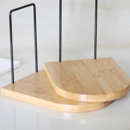 Natural bamboo desktop organizer and bookend with a simple, elegant design that optimises vertical storage space