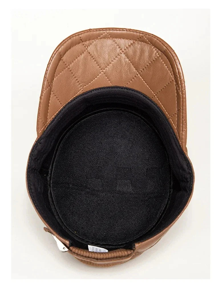 A stylish men's peaked cap made from genuine leather with a rhombus dome design and short brim
