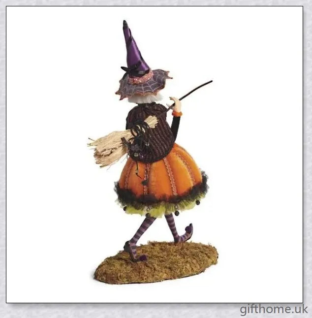 Enchanting Halloween witch figurine with unique designs and meticulous hand-painted details