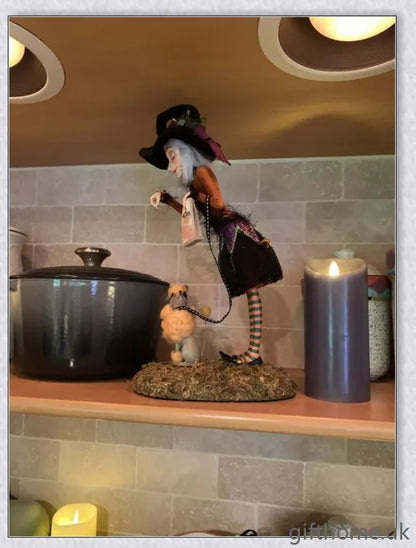 Enchanting Halloween witch figurine with unique designs and meticulous hand-painted details