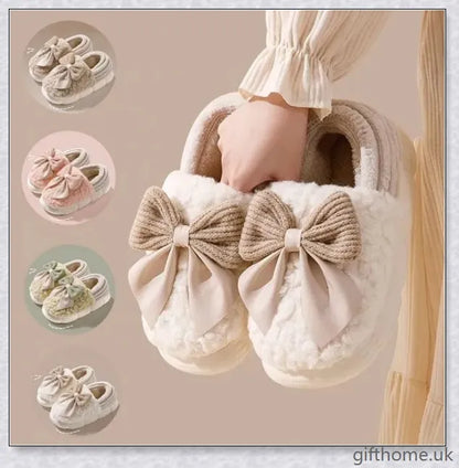 Pair of fluffy, bow-embellished slippers in a soft, suede-like material