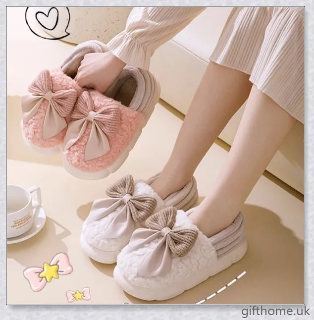 Pair of fluffy, bow-embellished slippers in a soft, suede-like material