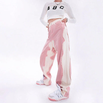Model wearing high-waisted, wide-leg pink denim jeans with a stylish and comfortable fit