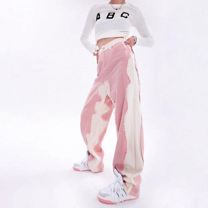 Model wearing high-waisted, wide-leg pink denim jeans with a stylish and comfortable fit