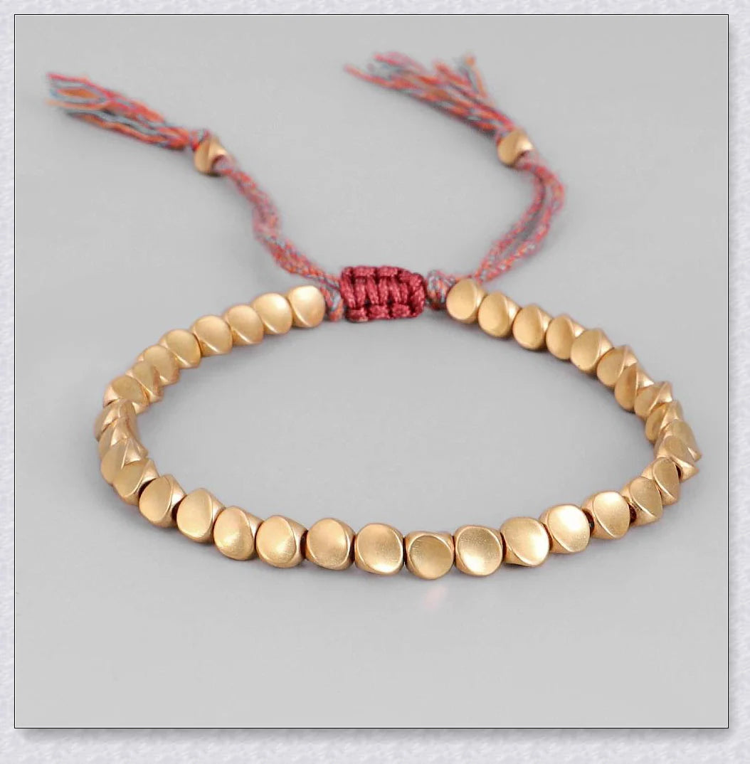 Handmade Tibetan copper bead bracelet with adjustable length and elegant design
