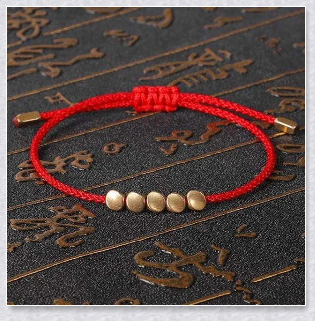 Handmade Tibetan copper bead bracelet with adjustable length and elegant design