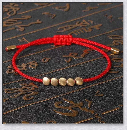 Handmade Tibetan copper bead bracelet with adjustable length and elegant design