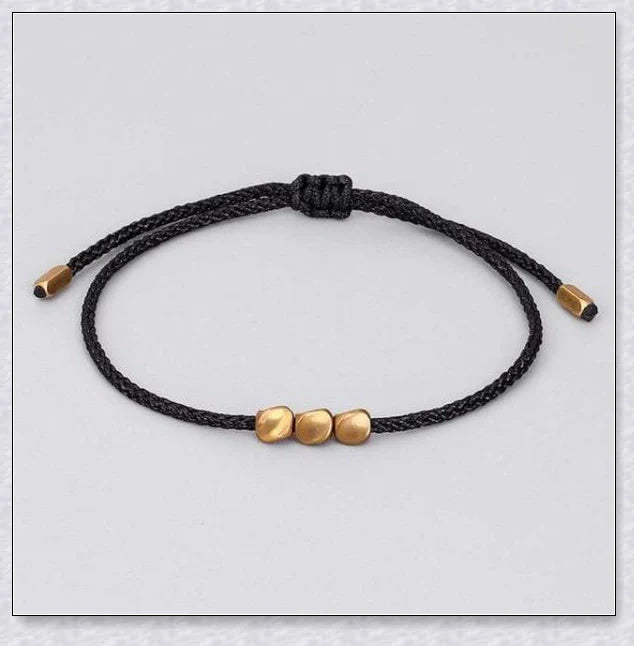 Handmade Tibetan copper bead bracelet with adjustable length and elegant design