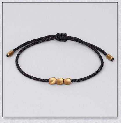 Handmade Tibetan copper bead bracelet with adjustable length and elegant design