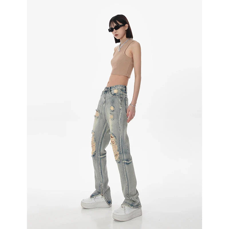 Women's high-waisted ripped straight leg jeans in a vintage blue wash