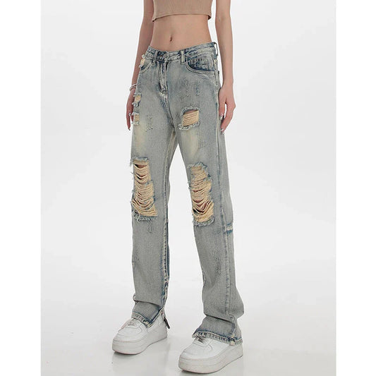 Women's high-waisted ripped straight leg jeans in a vintage blue wash