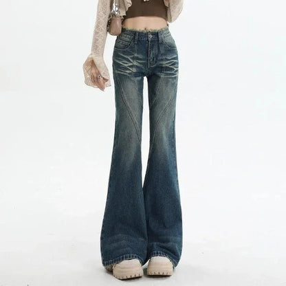 High-waisted flare jeans with a vintage wash, decorative elements, and a flattering silhouette