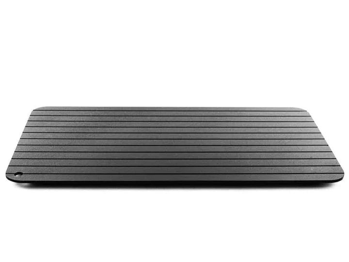 Premium aluminium fast defrosting tray for quick and even thawing of frozen foods, making meal preparation a breeze in the kitchen