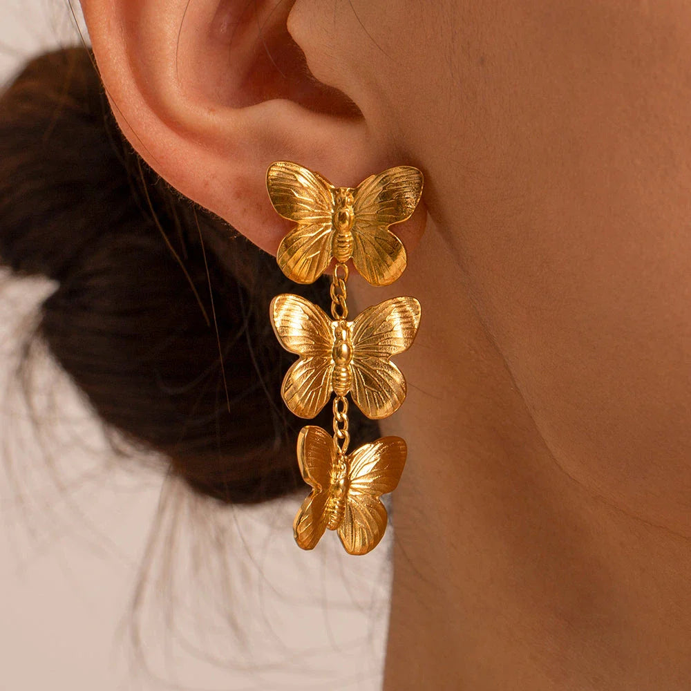 Exquisite stainless steel butterfly stud earrings with 18K gold plating, a chunky and oversized design for a bold statement.