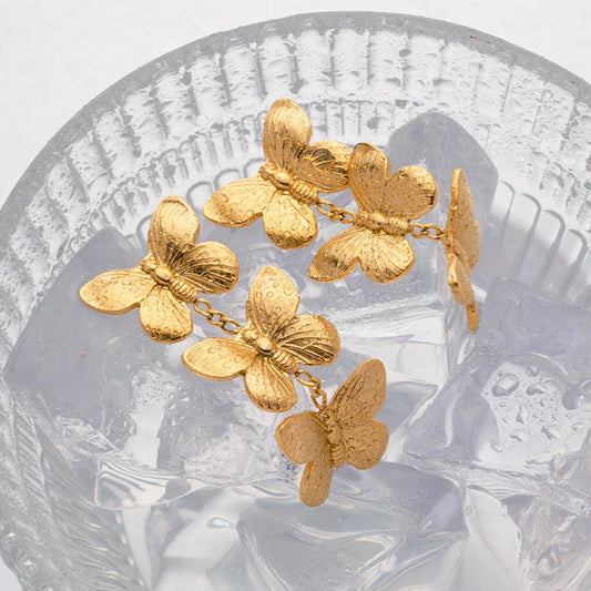 Exquisite stainless steel butterfly stud earrings with 18K gold plating, a chunky and oversized design for a bold statement.