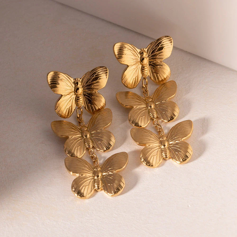 Exquisite stainless steel butterfly stud earrings with 18K gold plating, a chunky and oversized design for a bold statement.