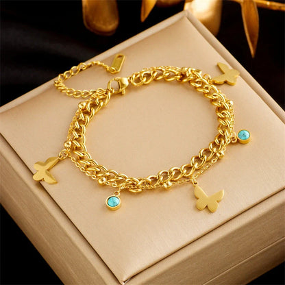 Gold plated punk fashion bracelet with double layer snake chain design and five-pointed star charm