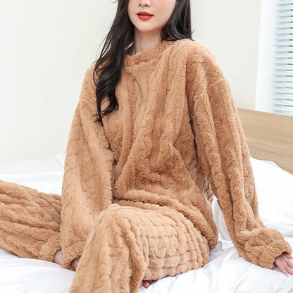 Cozy coral velvet pajama set with long sleeves and drawstring trousers for indoor and outdoor casual wear