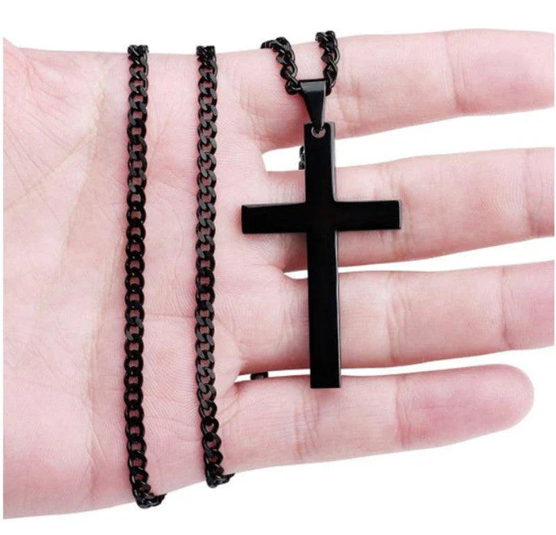 Stainless steel cross pendant necklace in black, silver, and gold colours, showcasing a classic and elegant design