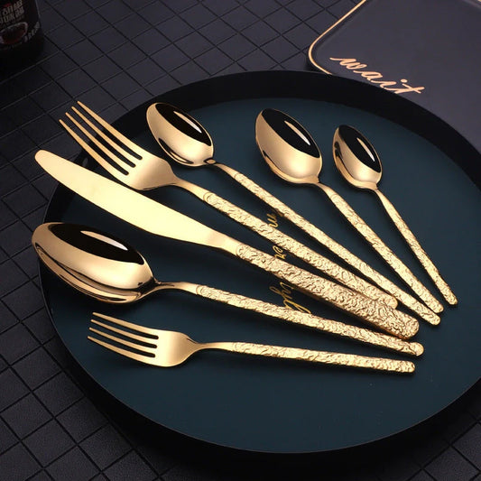 Premium steak cutlery set with embossed textured handles, made of durable stainless steel for a refined dining experience.