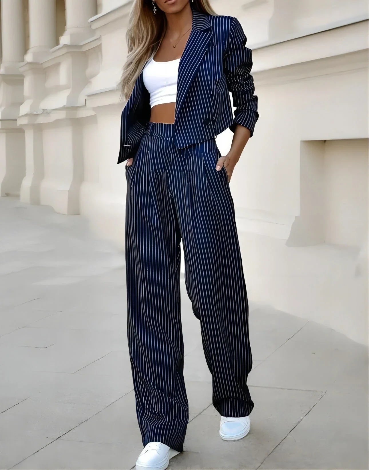 Fashionable striped suit sets featuring cropped tops and straight-leg pants in various color options