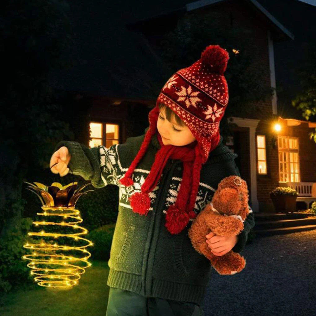 Elegant solar-powered garden lights with a whimsical pineapple design, automatically lighting up from dusk till dawn