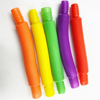 Colorful, flexible sensory tube toy for children's creative play, motor skill development, and tactile stimulation