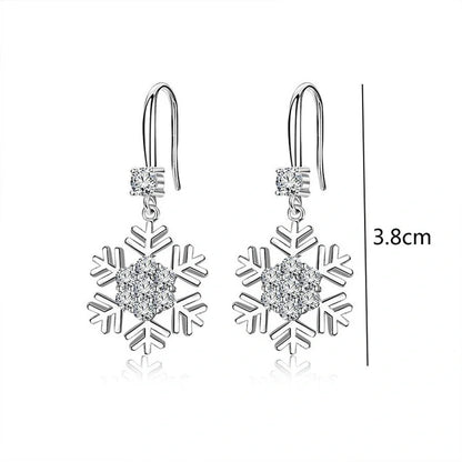 Elegant snowflake earrings with sparkling rhinestones, a festive fashion accessory for women