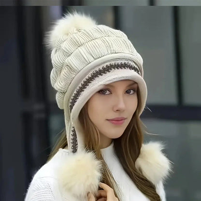 Knit fleece beanie with ear flaps and pompom in various colours for winter warmth