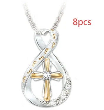 Elegant two-tone cross pendant with diamond-like accent, versatile and durable alloy design for everyday or special occasions.