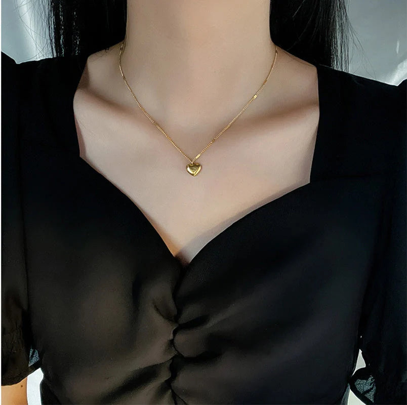 Vintage gold titanium steel heart pendant necklace with sectional chain