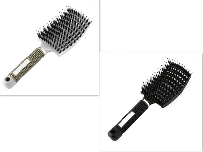 A premium hair brush with a sleek design, featuring soft bristles and a rounded massage function for healthy, detangled hair