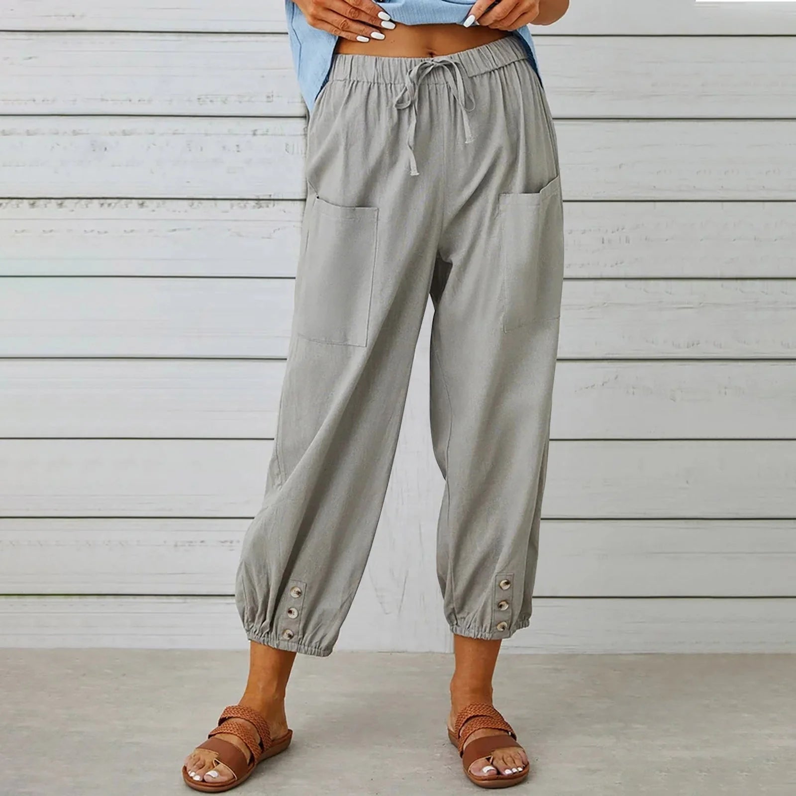 Women's cotton and linen drawstring tie pants with pockets, available in multiple colours and sizes.