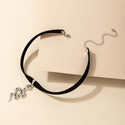Witchy Gothic Grunge Velvet Choker Necklace in silver and gold with baroque snake design